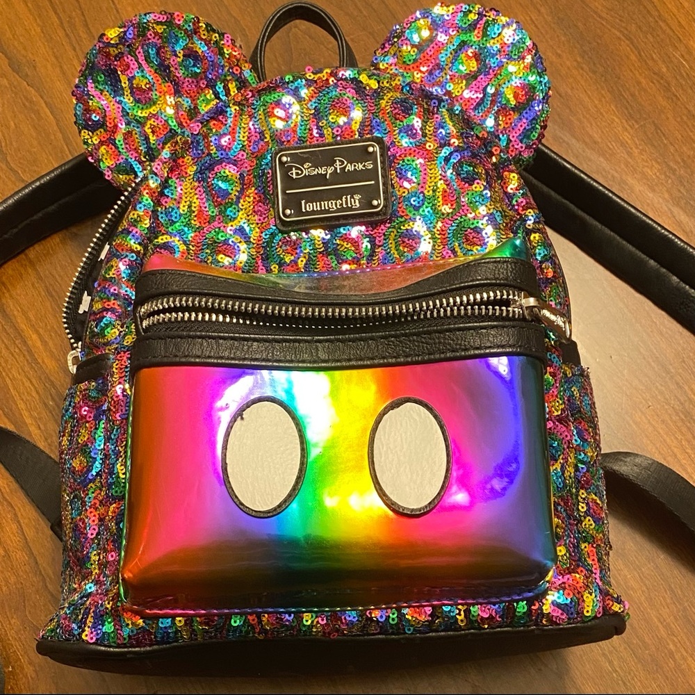 Disney Loungefly rainbow mini backpack.